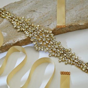 gold sparkly belt for dress Amabro Gold Belts For Women Rhinestone Chain Elastic Skinny Waist Fashion Crystal Rope Stretch Belts For Dresses at Amazon Women's Clothing store