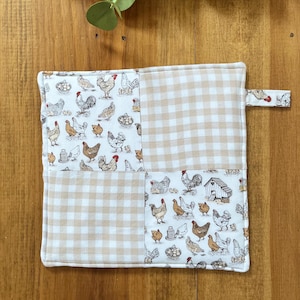 May include: A set of three ceramic mugs with a speckled, matte finish. The mugs are in shades of cream, light gray, and dark gray. Each mug has a simple, minimalist design and a rounded handle. Perfect for coffee or tea.