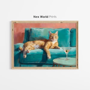 May include: A framed print featuring an orange tabby cat lounging on a teal sofa. A martini with an olive sits on a small table. The print is labeled "Nex World Prints".