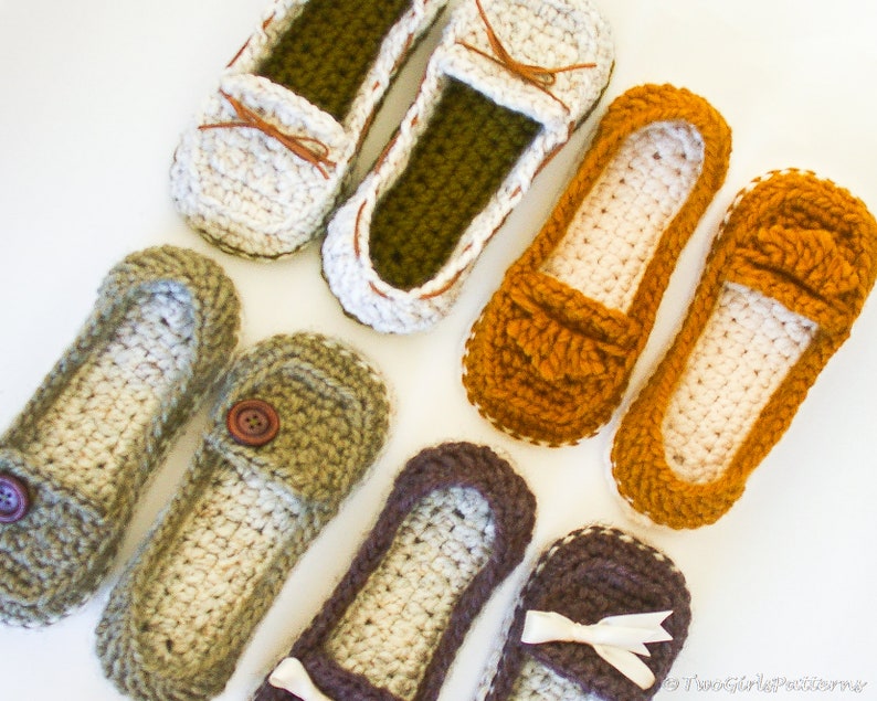 May include: Six pairs of crocheted slipper shoes in various colors, including white, green, orange, brown, and beige. The slippers have a loafer style with a decorative strap across the top.