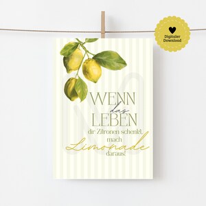 May include: A vertical print featuring a watercolor illustration of lemons and leaves. The print has the text "Wenn das Leben dir Zitronen schenkt, mach Limonade daraus!" in gold and green. A yellow digital download badge is in the upper right corner.