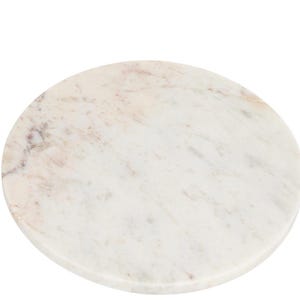 May include: A round marble slab with a white base and subtle gray and pink veining. The surface is smooth and polished, ideal for use as a decorative tray or serving board. The circular shape is simple and elegant.