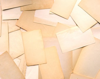 1/8 lb bundle of vintage aged, yellowed blank, plain paper for junk journals, scrapbooking, letter writing, craft supply (end pages, etc.)