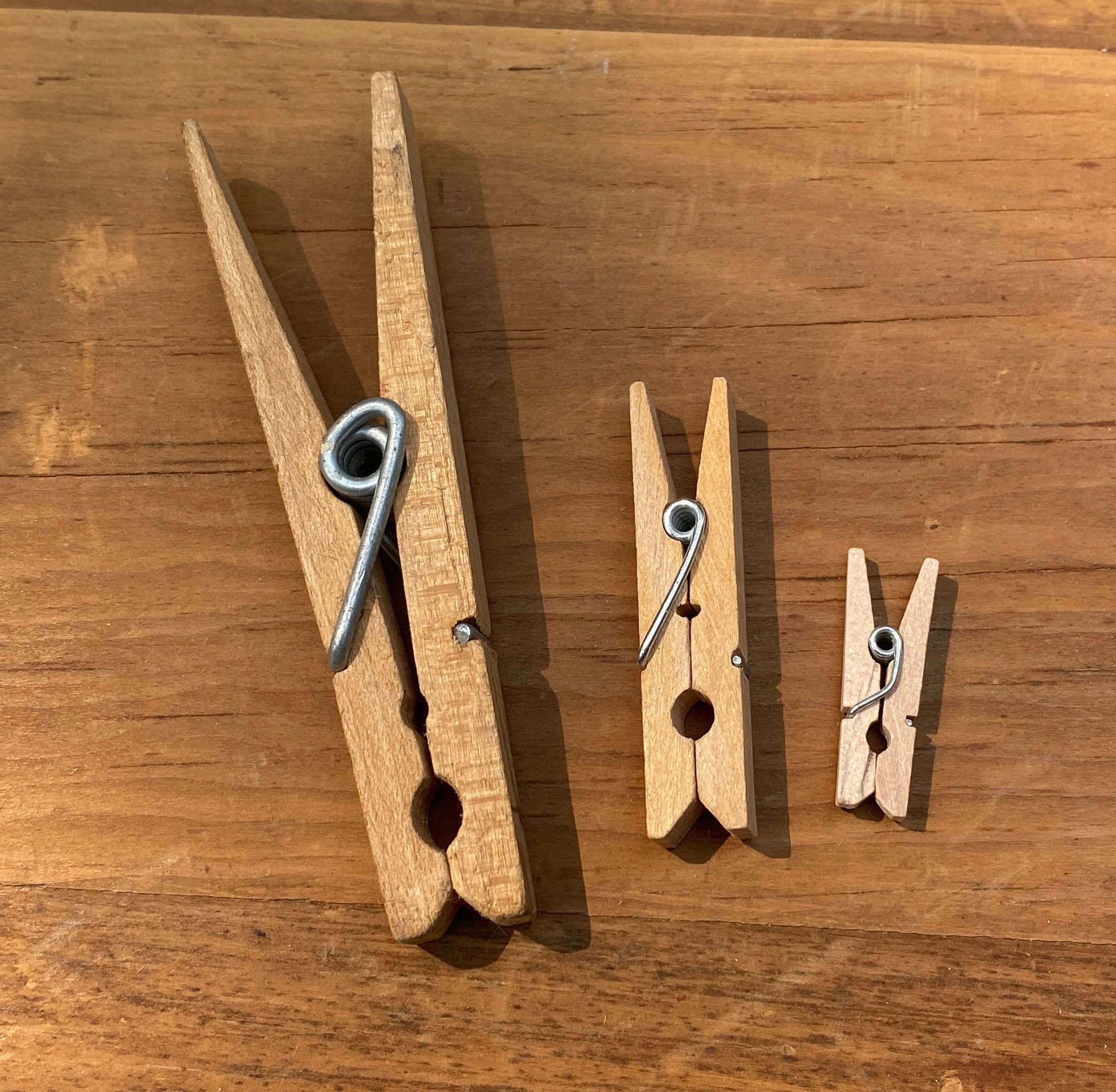 One dozen wooden clothes pins – shopjunket