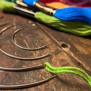 May include: A rustic wooden sign with the text "Welcome to our home" in white lettering. The sign features a distressed finish and a simple, inviting design, perfect for a front porch or entryway.
