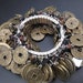 Melissa reviewed Vintage Chinese money coin large charm bracelet