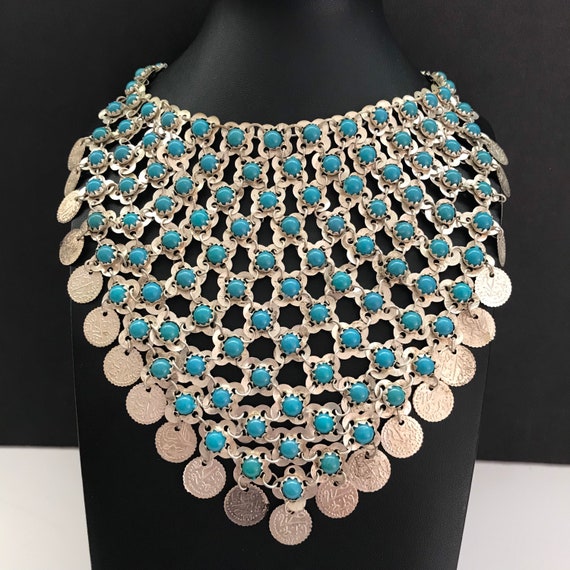 Amazon.com: NLCAC Turquoise Statement Necklace Boho Squash Blossom Concho Pendant  Collar Bib Necklace Western Turquoise Jewelry for Women (Concho Bib) :  Clothing, Shoes & Jewelry