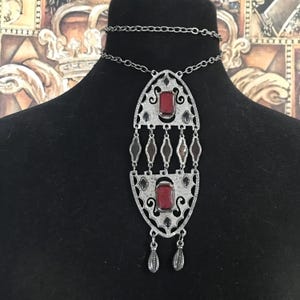 Large pendant silver tone metal long necklace, collectible statement costume jewelry, 1960s 1970s