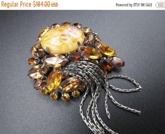 Brown Amber rhinestone 1950s Fringe brooch and a m