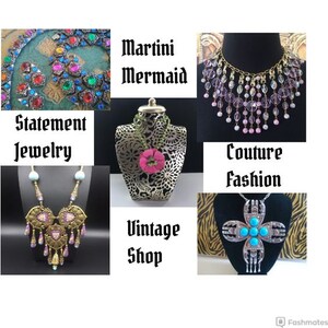 May include: A collage of images featuring various jewelry pieces, including a statement necklace with colorful stones, a delicate gold chain necklace with pink and clear beads, a vintage-style necklace with a floral design, and a silver cross pendant with turquoise stones. The text "Martini Mermaid", "Statement Jewelry", "Couture Fashion", "Vintage Shop" is also included in the image.