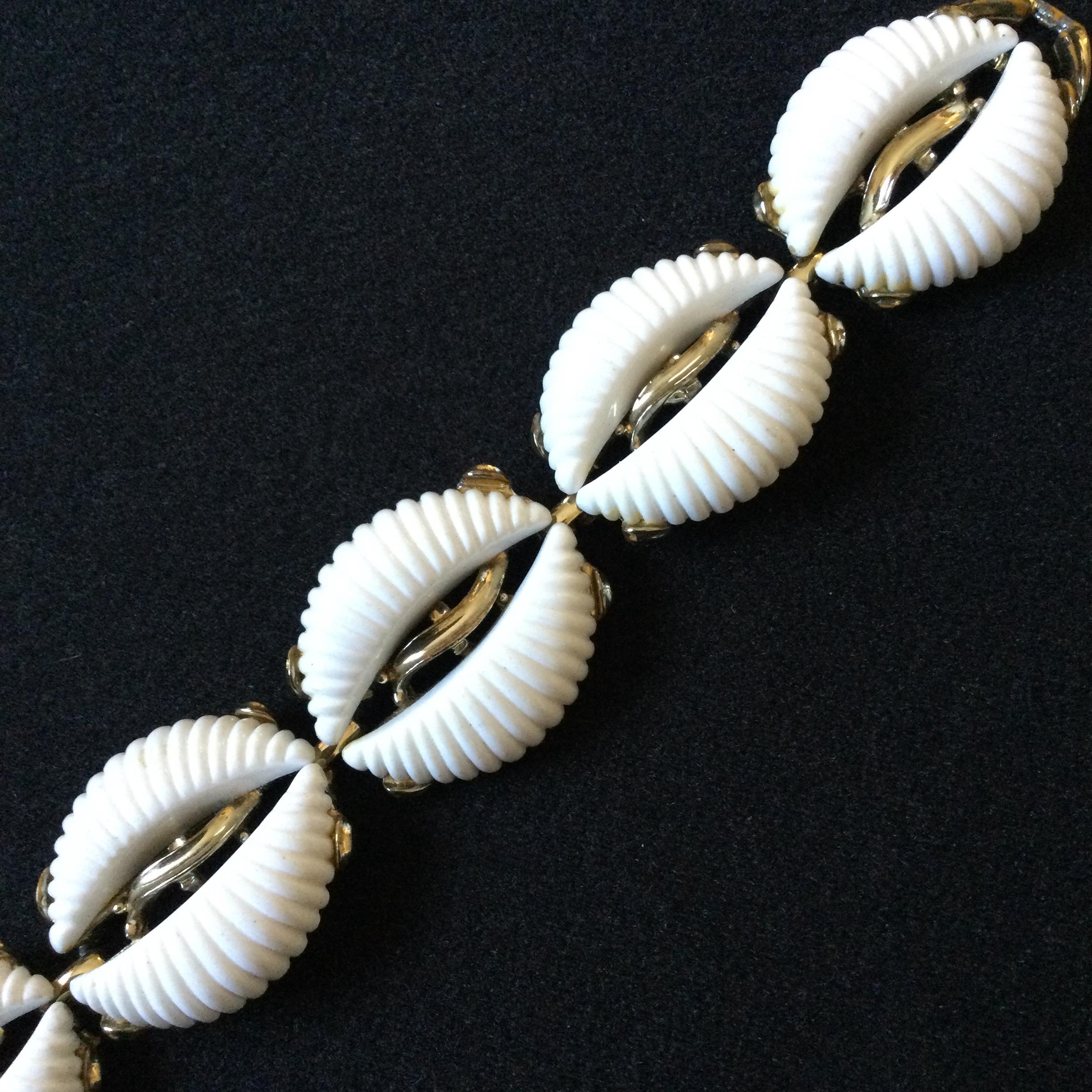 B.S.K. Signed Vintage White Thermoset Gold Tone Metal Bracelet 