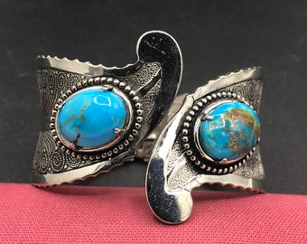 Silver tone metal & faux turquoise wide clamper bracelet