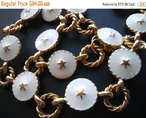 Stylish gold tone metal creamy off-white enamel 19