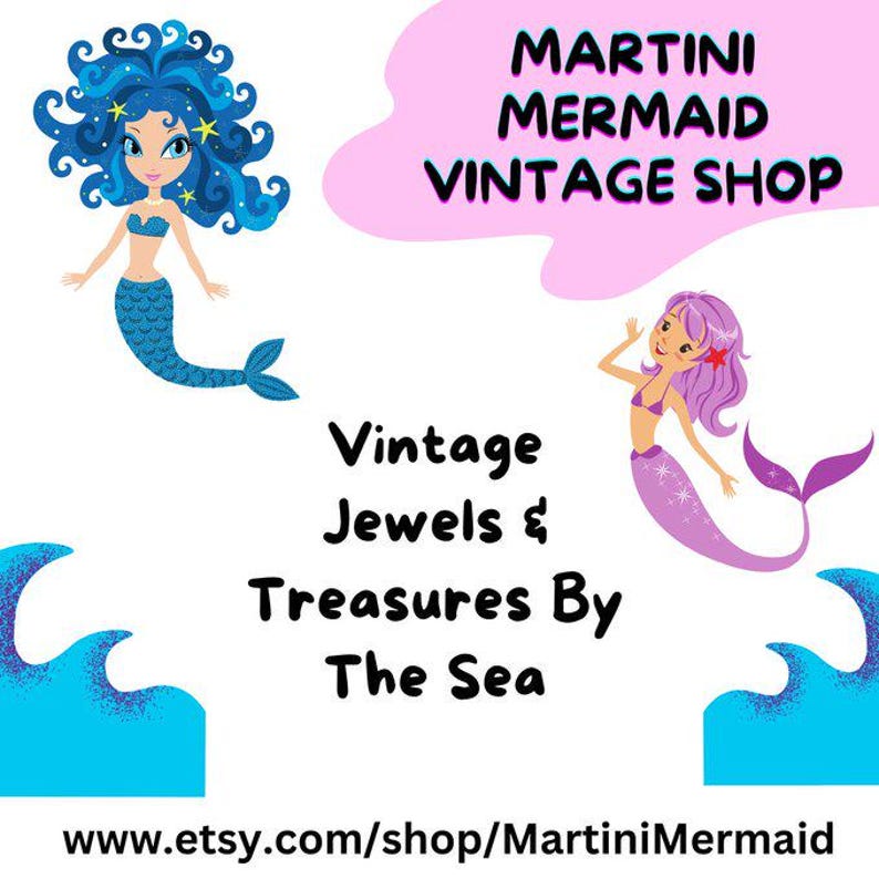 May include: A logo for Martini Mermaid Vintage Shop featuring a blue-haired mermaid on the left and a purple-haired mermaid on the right. The text reads Martini Mermaid Vintage Shop, Vintage Jewels & Treasures By The Sea, and www.etsy.com/shop/MartiniMermaid.