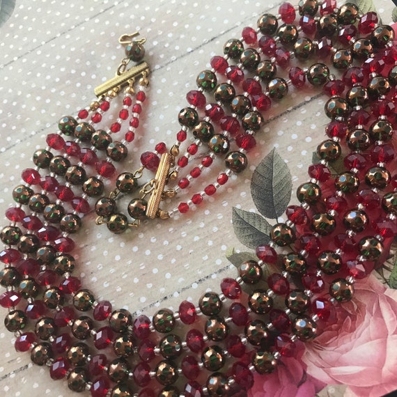 Red gold bronze four strand glass beaded collectible necklace