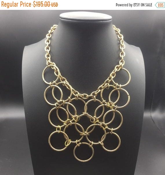 Great geometric goldtone metal bib necklace
