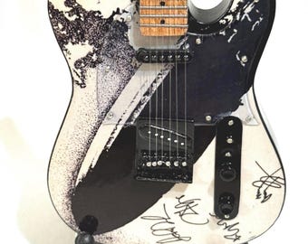 Led Zeppelin i 10” Guitar Tribute with stand.  1:4 scale with reproduction band autographs.