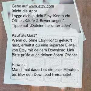 May include: Two white paper sheets with German text, including instructions on how to download files from Etsy. The text includes phrases like "Gehe auf www.etsy.com" and "Dateien herunterladen".