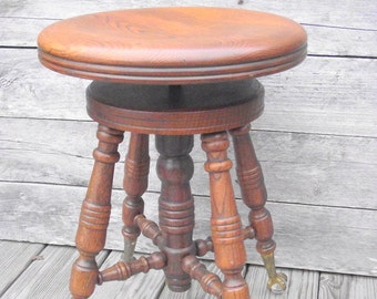 Antique Piano Music Stool Eagle Claw Glass Feet Round - The A. Merriam Co. So. Acton Mass - Solid wood and iron