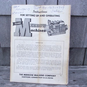 May include: Black and white instruction manual for setting up and operating a Class M Merrow sewing machine. The cover features a photo of the machine and the text "Class M Merrow Machines". The manual is published by The Merrow Machine Company, Hartford, Connecticut, U.S.A. 06106.