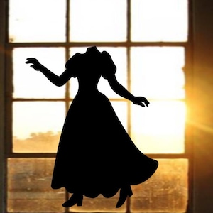 May include: A black silhouette of a woman in a long dress with puffed sleeves and a flowing skirt. The figure is positioned in front of a window with a warm, golden light shining through the panes, creating a dramatic contrast.