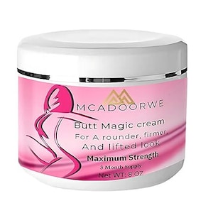 Pode incluir: Um frasco branco de creme MCADOORWE Butt Magic com um rótulo rosa. O rótulo apresenta uma figura rosa estilizada e o texto "Para uma aparência mais redonda, firme e levantada. Força máxima. Peso líquido: 8 oz."