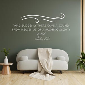Puede incluir: Una escena de salón moderno con un sofá gris, una mesa auxiliar de madera y una pared verde con texto blanco que dice "AND SUDDENLY THERE CAME A SOUND FROM HEAVEN AS OF A RUSHING MIGHTY WIND" y "Acts 2:2".