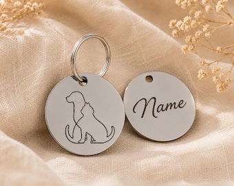 Llaveros con motivos de animales, fabricados en acero inoxidable, con la imagen de un perro, un gato o una huella de pata.