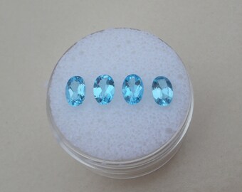 4 gemme di topazio blu svizzero, pietre ovali sfaccettate 6 x 4 mm