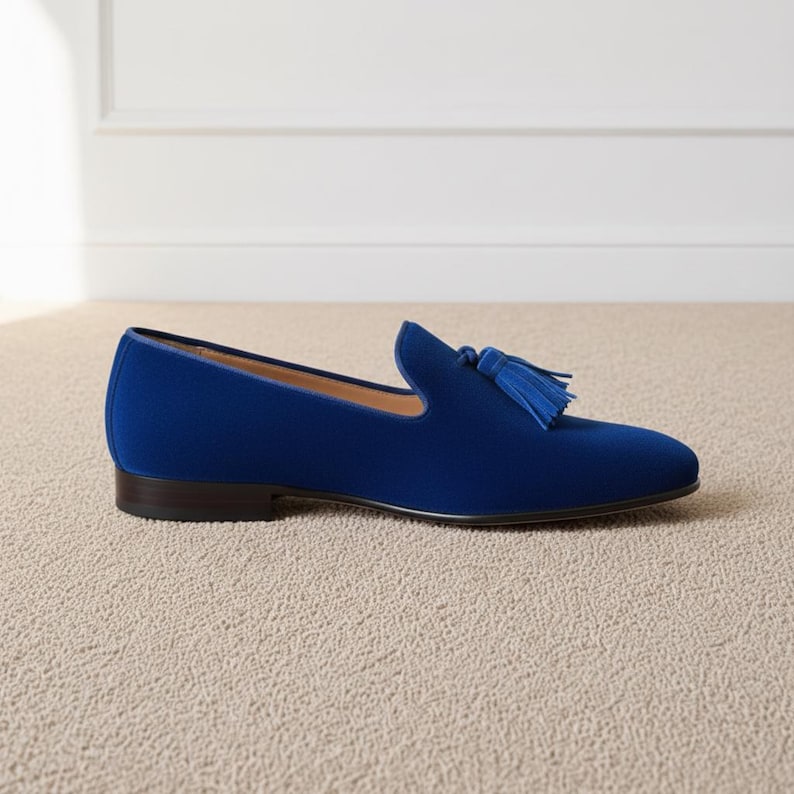 Luxury royal blue formal loafers with classic tassel detail and sleek evening wear design