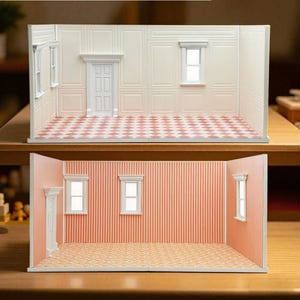 May include: Two miniature room dioramas. The top room features white paneled walls and a pink and white checkered floor. The bottom room features pink and white striped wallpaper, white window frames, a white door frame, and a patterned floor.
