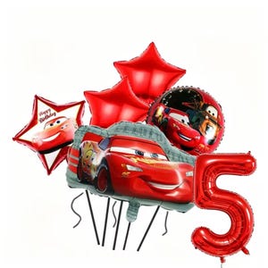 May include: A set of red foil balloons, including star-shaped and round balloons featuring Lightning McQueen from the Cars film. A large red number 5 balloon is also present, along with a balloon that says "Happy Birthday".