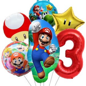 Może przedstawiać: Zestaw kolorowych balon&oacute;w foliowych z postaciami z serii gier wideo Super Mario. Zawiera czerwony balon z cyfrą 3, złotą gwiazdę, czerwonego grzyba oraz balony z Mario, Peach i Yoshim.