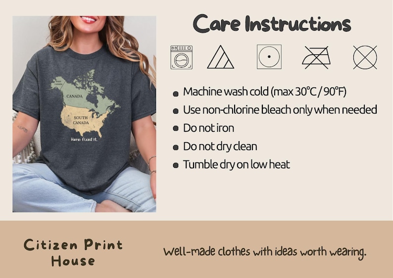 May include: A dark gray t-shirt featuring a map graphic of North America with the United States labeled as South Canada and the text Here: fixed it. The image includes care instructions for machine washing cold at 90&deg;F, non-chlorine bleach, and tumble dry.