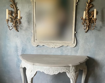 elegant demilune console and mirror