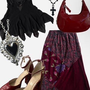 May include: A collection of gothic-inspired fashion items. Includes a black slip dress, a red patent leather handbag, a long burgundy skirt with floral and paisley patterns, burgundy heels, and necklaces with crosses and hearts.