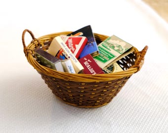Vintage Matchbooks in Small Wicker Basket- 14 matchbooks