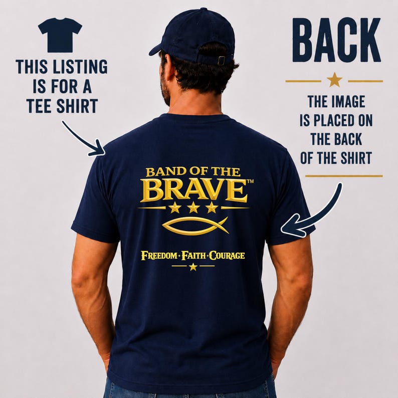 May include: A navy blue t-shirt featuring a gold graphic on the back. The text reads BAND OF THE BRAVE with three stars, a fish symbol, and the words FREEDOM FAITH COURAGE. Additional text indicates this listing is for a tee shirt.