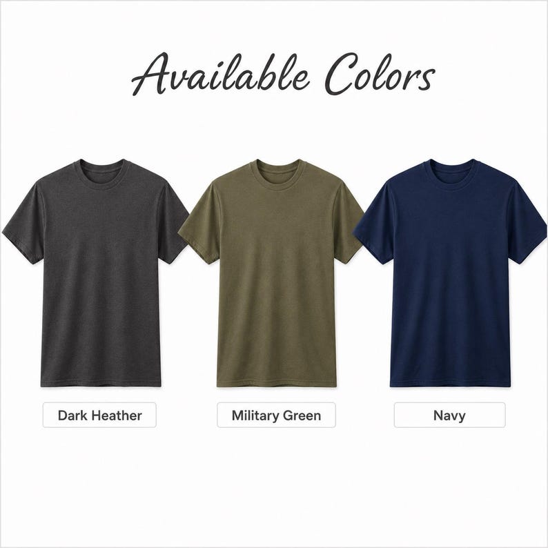 May include: Three short-sleeved crew neck t-shirts displayed in a row with the text Available Colors at the top. The shirts are colored dark heather, military green, and navy, with corresponding labels below each shirt identifying the color.