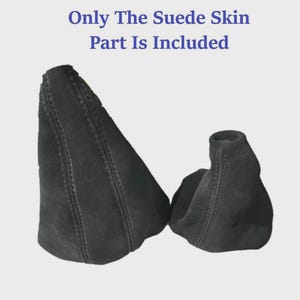 May include: Two black suede car shift boots. The larger boot is cone-shaped, and the smaller boot is cylindrical. The text "Only The Suede Skin Part Is Included" is in blue above the boots.