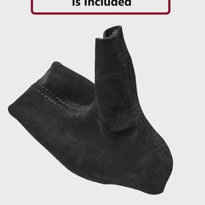 May include: Black suede shift boot cover. The image shows a black suede shift boot cover with visible stitching. The text in the image reads "Only The Suede Part Is Included".