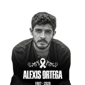 May include: Black and white image of a man with dark curly hair and a beard. The text "ALEXIS ORTEGA" is displayed in bold white letters, with the years "1987-2026" below. A decorative ribbon graphic is above the name.
