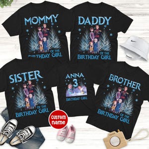 May include: Black t-shirts with a Frozen theme. The shirts have the words "MOMMY", "DADDY", "SISTER", "ANNA 3", and "BROTHER" in blue text. Each shirt features a graphic of characters from the movie and the phrase "OF THE BIRTHDAY GIRL".