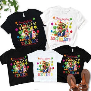 May include: A set of three ceramic mugs with a speckled, matte finish. The mugs are in shades of cream, light gray, and dark gray. Each mug has a simple, minimalist design and a rounded handle.