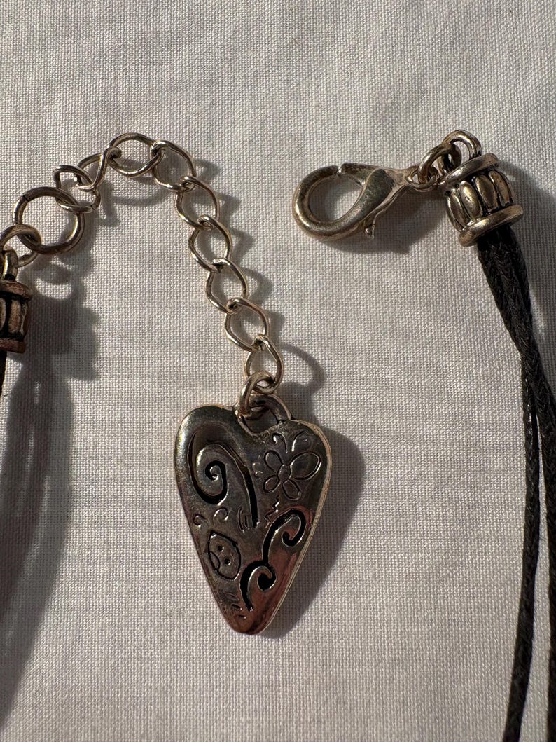 May include: A handmade wooden sign with the text "Welcome" in a playful font. The sign features a distressed white background and a dark brown frame, ideal for a front door or entryway. The sign measures approximately 30 cm wide.