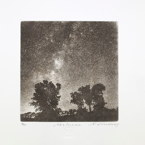 May include: A black and white print of a night scene with a starry sky and silhouetted trees. The print is titled "Nocturne" and signed by N. Lindsay. The artwork is displayed on a white background.