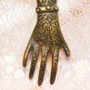 Henna Hand, brass sculpture, wall display or bottle opener