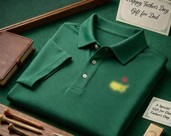 May include: A green polo shirt with a three-button placket and a golf course logo. The image includes golf tees, a divot repair tool, a money clip, and cards that read "Happy Father's Day Gift for Dad" and "A Special Gift for Dad, Father's Day."