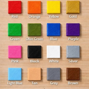 May include: Image showcasing a variety of color options, including red, orange, yellow, gold, green, olive green, blue, purple, pink, black, white, silver, light blue, tan, gray, and brown. Text reads "Color Options" and "Options for grading services include PSA, BGS, SGC, CGC, and TAG!"
