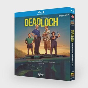 May include: A Blu-ray disc case for "Deadloch" Season 2. The cover features a teal background with the show's title in yellow and a group of four people standing on a platform. The Prime Video logo is visible.